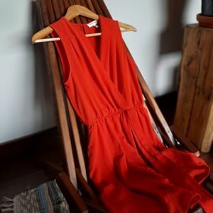 Monteau size sm. Orange Red.